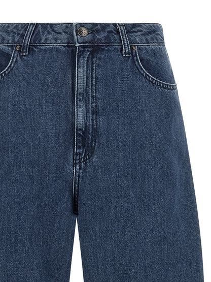 Jeans by ROTATE BIRGER CHRISTENSEN for women in organic denim cotton & leather blue features an sophisticated high rise and relaxed-fit with a precise long, creating a sophisticated and sophisticated silhouette.