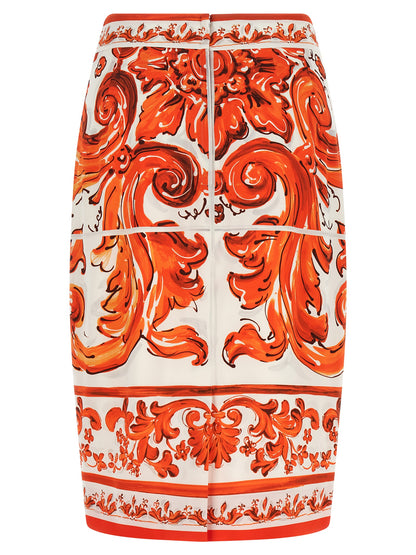 Skirt by Dolce & Gabbana for women in silk orange & print showcases a dramatic silhouette, artfully capturing the essence of the Essence Maiolica Women's High Rise Silk Skirt in a dramatic midi cut for a refined look.