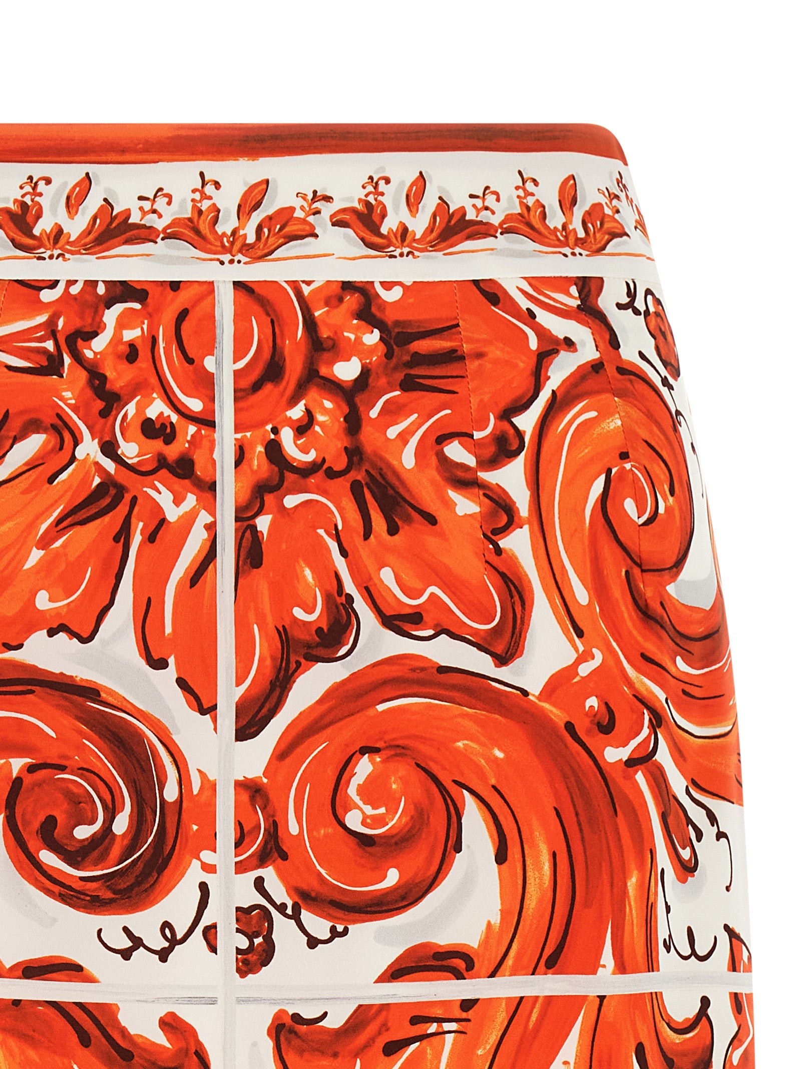 Skirt by Dolce & Gabbana for women in silk orange & print features a captivating silhouette, showcasing the captivating Essence Maiolica Women's High Rise Silk Skirt design with a sophisticated midi for a captivating look.