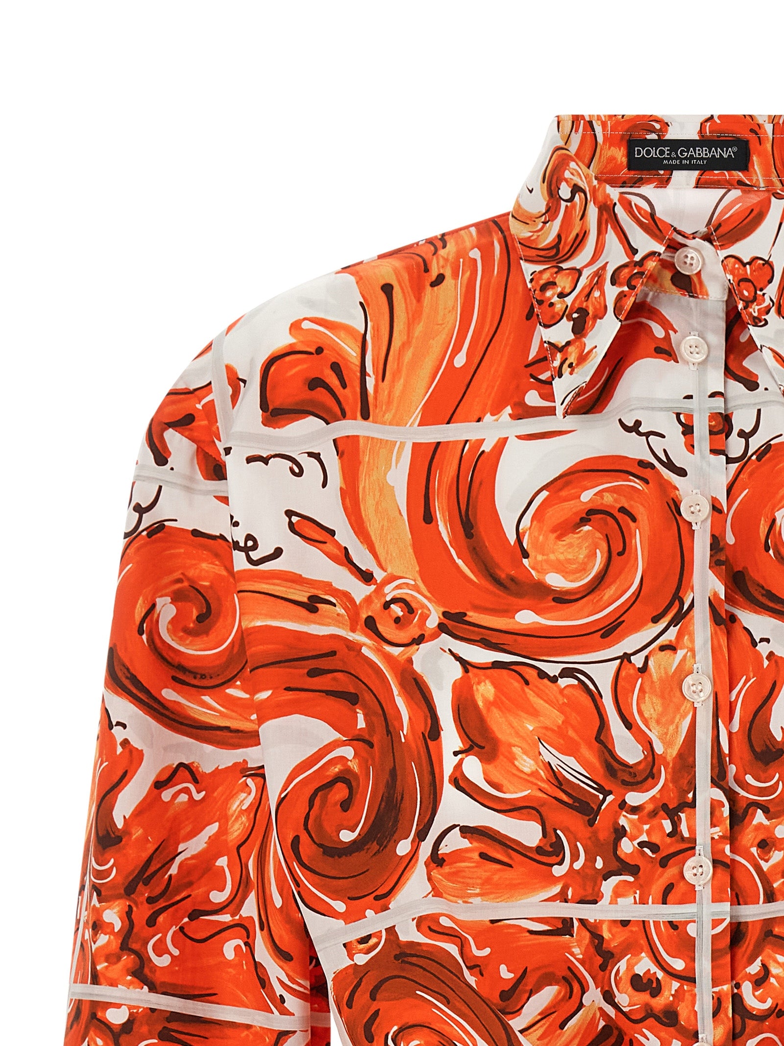 Blouse by Dolce & Gabbana for women in cotton orange & print presents a discerning silhouette, showcasing a sophisticated and for a truly discerning finish.