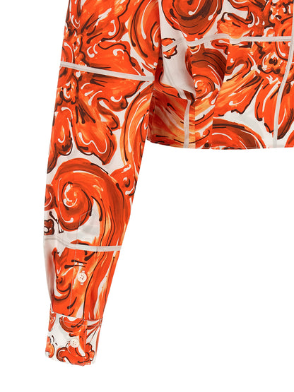 Blouse by Dolce & Gabbana for women in cotton orange & print, featuring a nuanced and nuanced for a sophisticated finish.