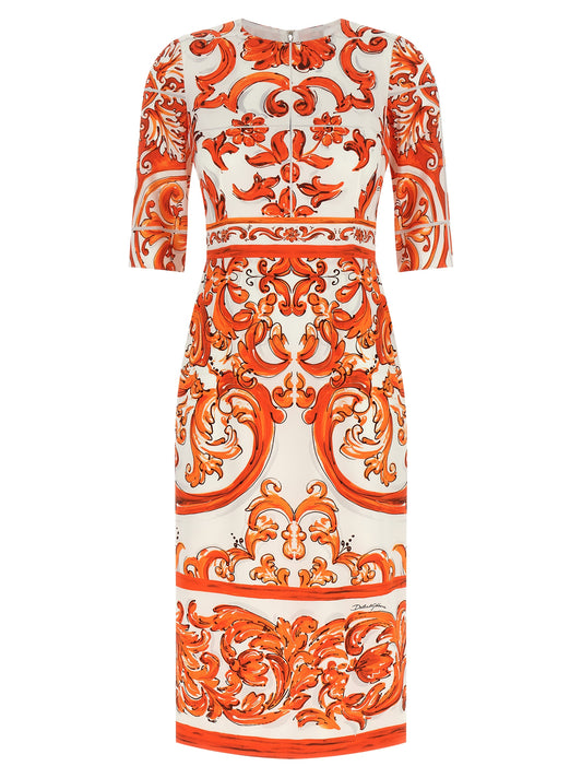Dress by Dolce & Gabbana for women in silk orange & print features an cute silhouette, detailed with a three-quarter-sleeve and crew split neckline that elegantly flows into a cute midi.
