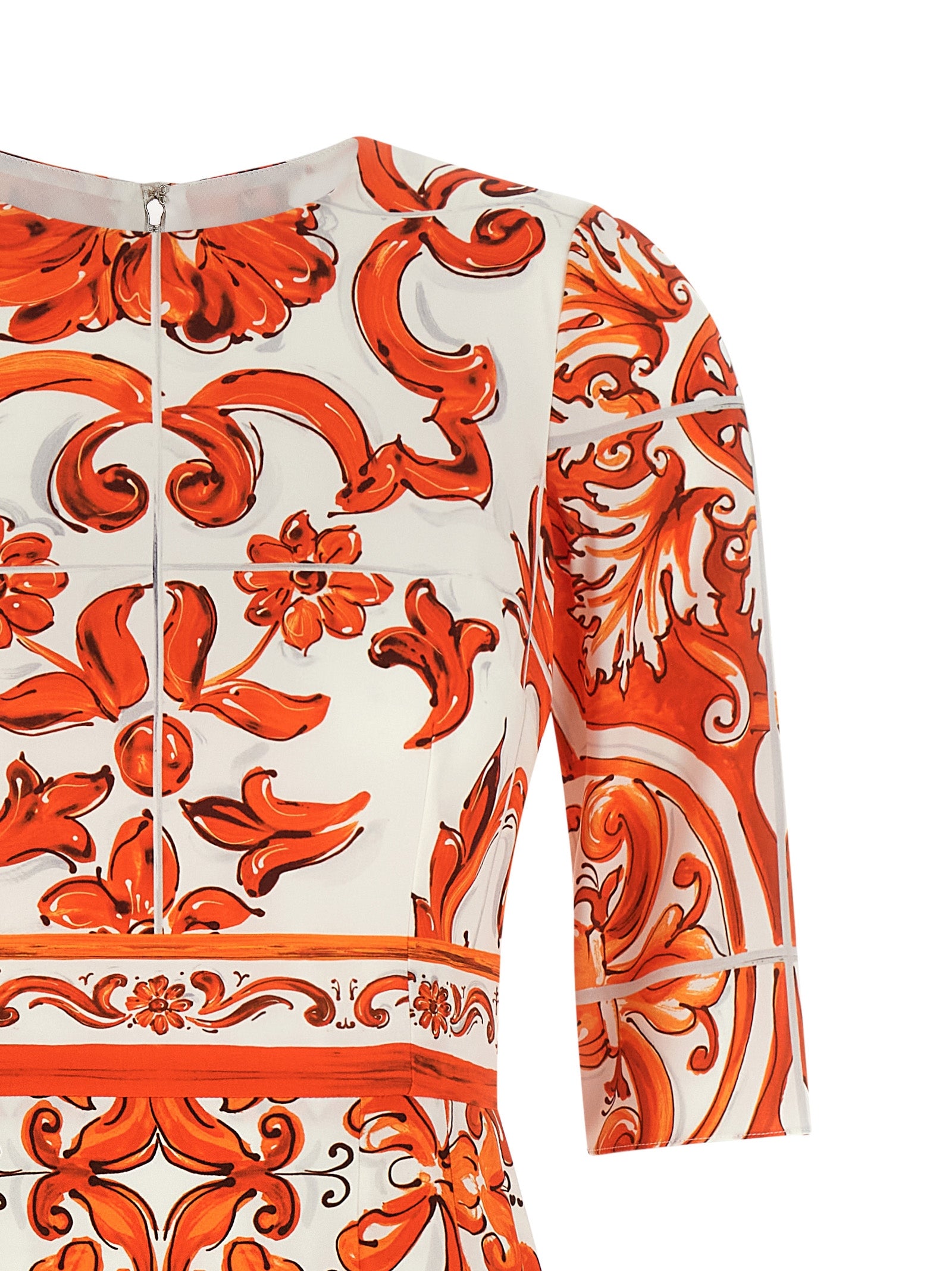Dress by Dolce & Gabbana for women in silk orange & print showcases a striking silhouette, elegantly detailed with a , refined crew split neckline, and a striking midi for a striking finish.