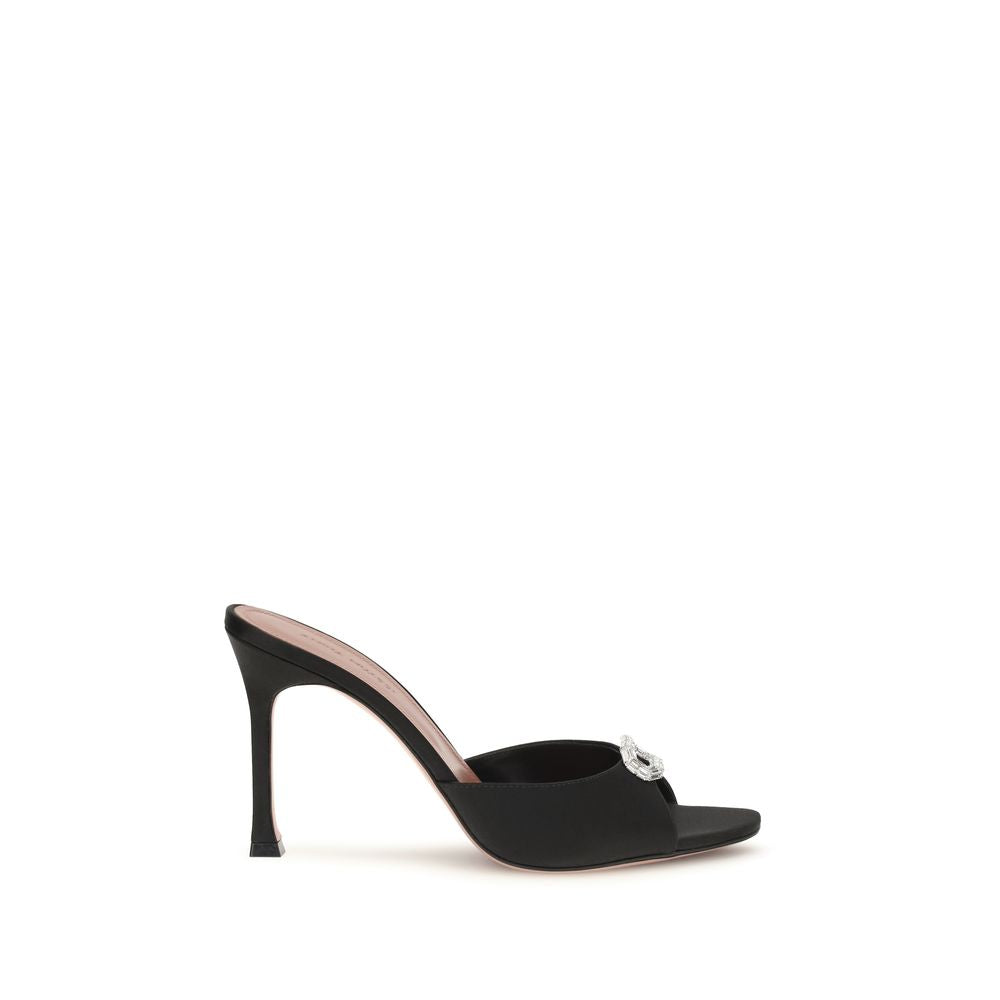 Stiletto Mules Sandals by Amina Muaddi for women in silk satin & crystal black presents a sculptural silhouette, showcasing the Camelia Women's Silk Satin & Crystal Stiletto Mules Sandals design with a sculptural stiletto and open toe style for a premium look.