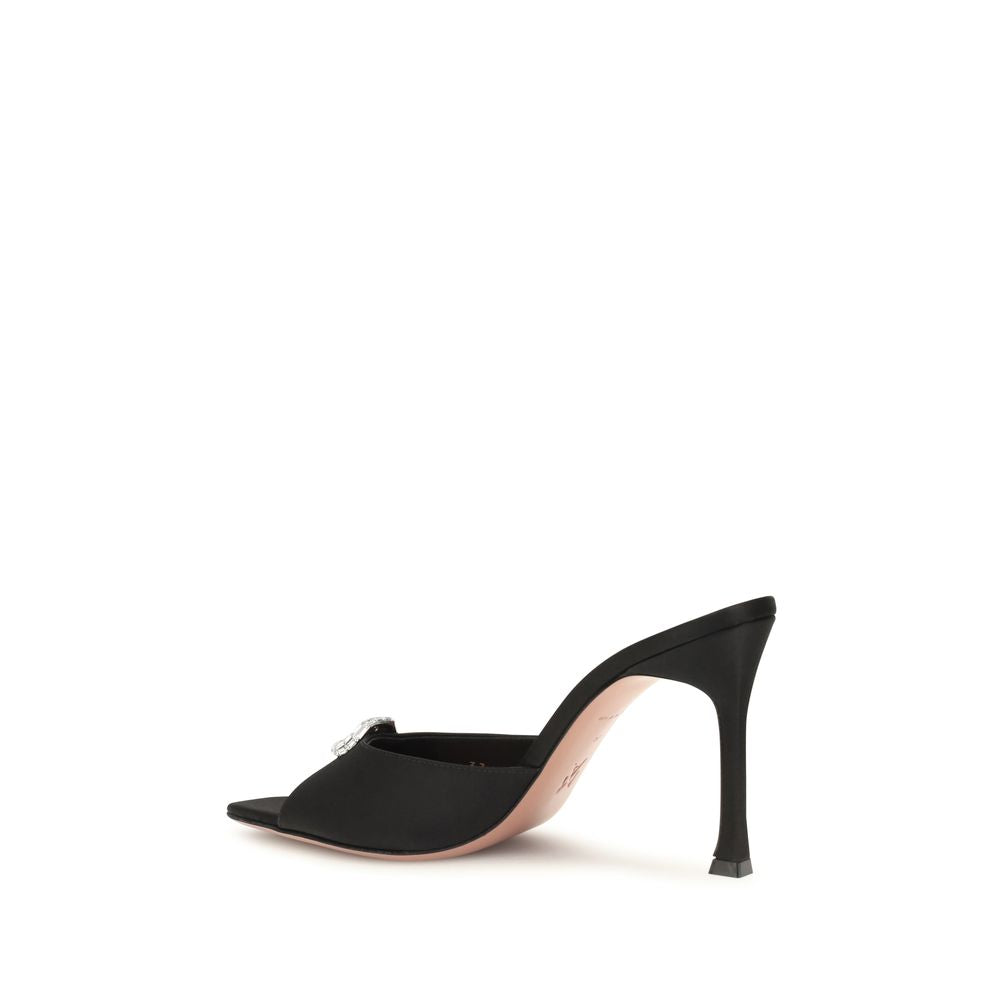 Stiletto Mules Sandals by Amina Muaddi for women in silk satin & crystal black features an effortlessly chic silhouette from the Camelia Women's Silk Satin & Crystal Stiletto Mules Sandals collection, showcasing a effortlessly chic stiletto and elegant open toe style.