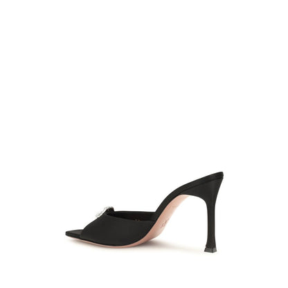 Stiletto Mules Sandals by Amina Muaddi for women in silk satin & crystal black features an effortlessly chic silhouette from the Camelia Women's Silk Satin & Crystal Stiletto Mules Sandals collection, showcasing a effortlessly chic stiletto and elegant open toe style.