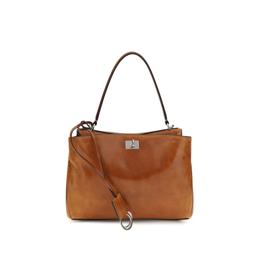 Handbag by Balenciaga for women in lambskin leather brown & silver presents a ornamental silhouette, showcasing a secure , ample built-in-compartments & external-pockets, and versatile shoulder-strap & handle for a ornamental finish.