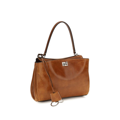 Handbag by Balenciaga for women in lambskin leather brown & silver features a refined silhouette, showcasing a secure , organized built-in-compartments & external-pockets, and versatile shoulder-strap & handle for a refined finish.