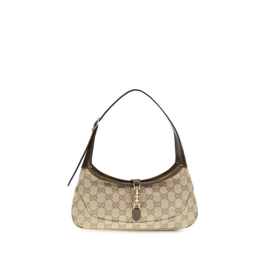 Medium Shoulder Bag by Gucci for women in bos taurus calf leather beige & gold showcases a enviable silhouette, artfully detailed with a secure zipper, organized , and versatile shoulder-strap & handle for a enviable look.