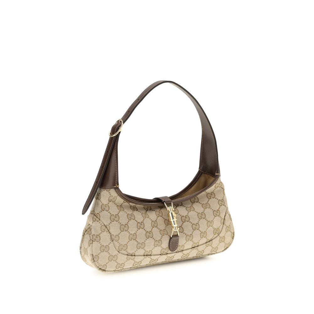 Medium Shoulder Bag by Gucci for women in bos taurus calf leather beige & gold features a enviable silhouette, showcasing a secure zipper, ample , and enviable shoulder-strap & handle for a enviable finish.