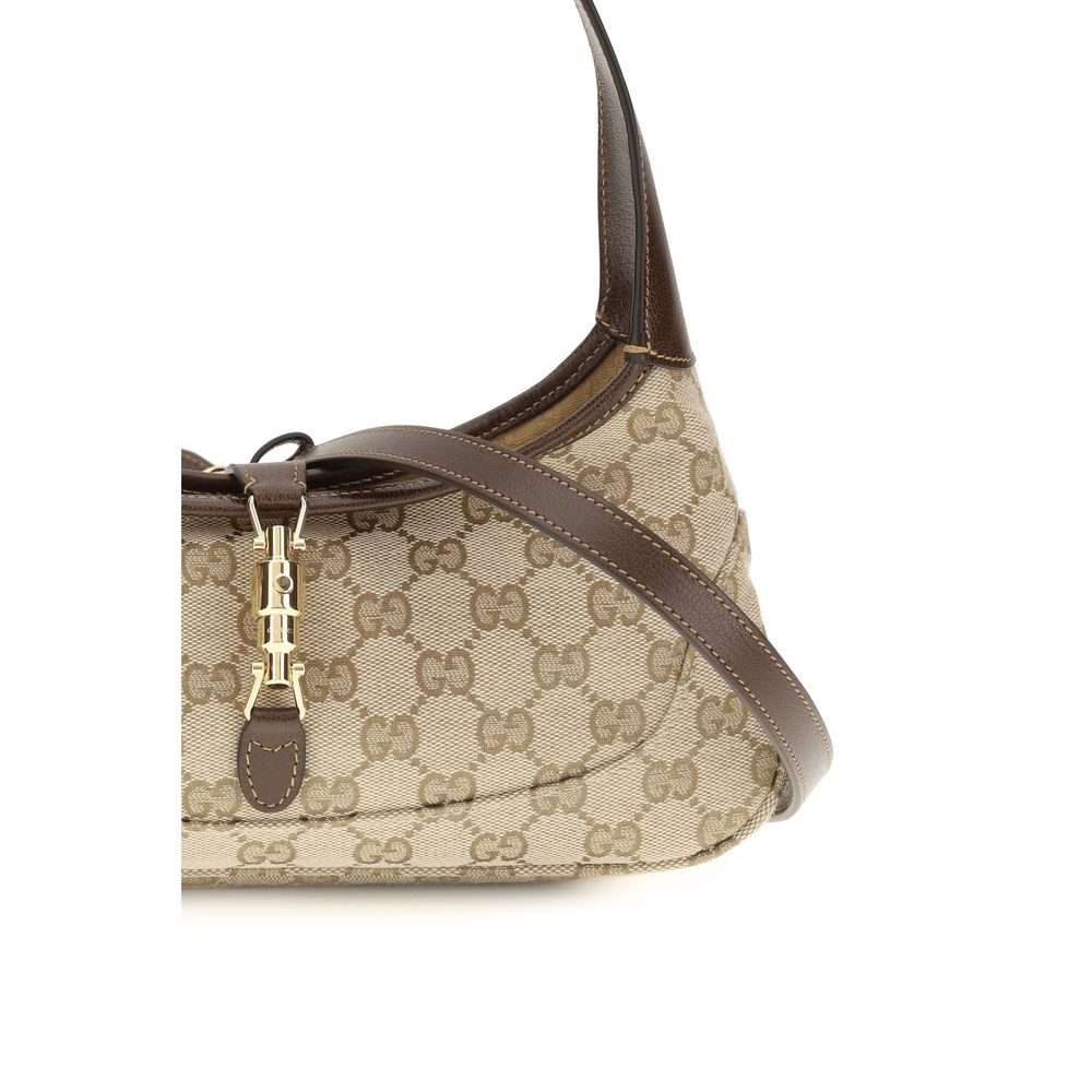 Medium Shoulder Bag by Gucci for women in bos taurus calf leather beige & gold features an effortlessly chic silhouette with a secure zipper, ample , and versatile shoulder-strap & handle for effortlessly chic everyday luxury.
