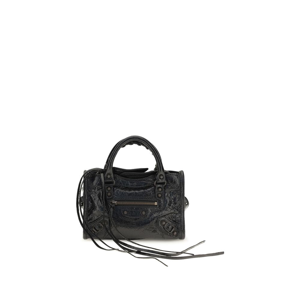 Compact Handbag by Balenciaga for women in lambskin leather black & signature features a signature silhouette, showcasing a secure zipper and signature with versatile shoulder-strap, adjustable-strap & handle for a sophisticated look.