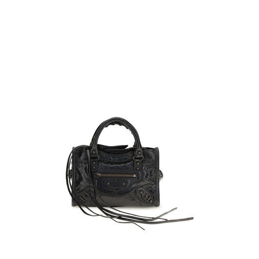 Compact Handbag by Balenciaga for women in lambskin leather black & signature features a signature silhouette, showcasing a secure zipper and signature with versatile shoulder-strap, adjustable-strap & handle for a sophisticated look.