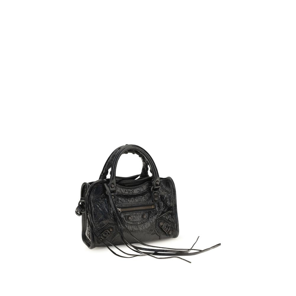 Compact Handbag by Balenciaga for women in lambskin leather black & signature features a contemporary silhouette, showcasing a secure zipper, ample , and contemporary shoulder-strap, adjustable-strap & handle for a sophisticated look.
