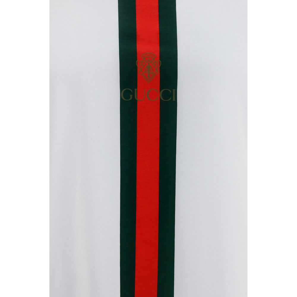 T-Shirt by Gucci for men in cotton white, print & striped showcases a dramatic silhouette, elegantly detailed with a dramatic and for a truly dramatic finish.