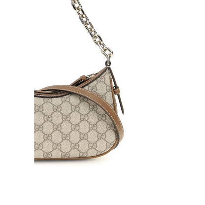 Small Shoulder Handbag by Gucci for women in leather beige, gold & monogram features a refined silhouette, showcasing a secure zipper, organized , and versatile shoulder-strap for a refined finish.