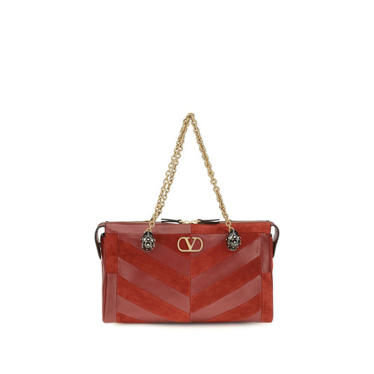 Medium Shoulder Bag by Valentino Garavani for women in bio-acetate & bos taurus calf leather gold, multicolor, chevron, signature & patchwork features an effortlessly chic silhouette with a secure zipper, ample single-compartment, and versatile shoulder-strap, adjustable-strap & handle for effortlessly chic everyday luxury.