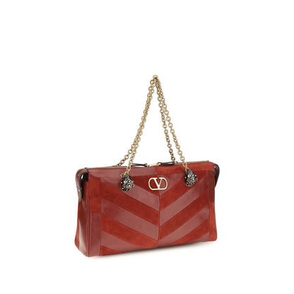 Medium Shoulder Bag by Valentino Garavani for women in bio-acetate & bos taurus calf leather gold, multicolor, chevron, signature & patchwork features a effortless chic silhouette with a secure zipper, ample single-compartment, and versatile shoulder-strap, adjustable-strap & handle for a effortless chic finish.