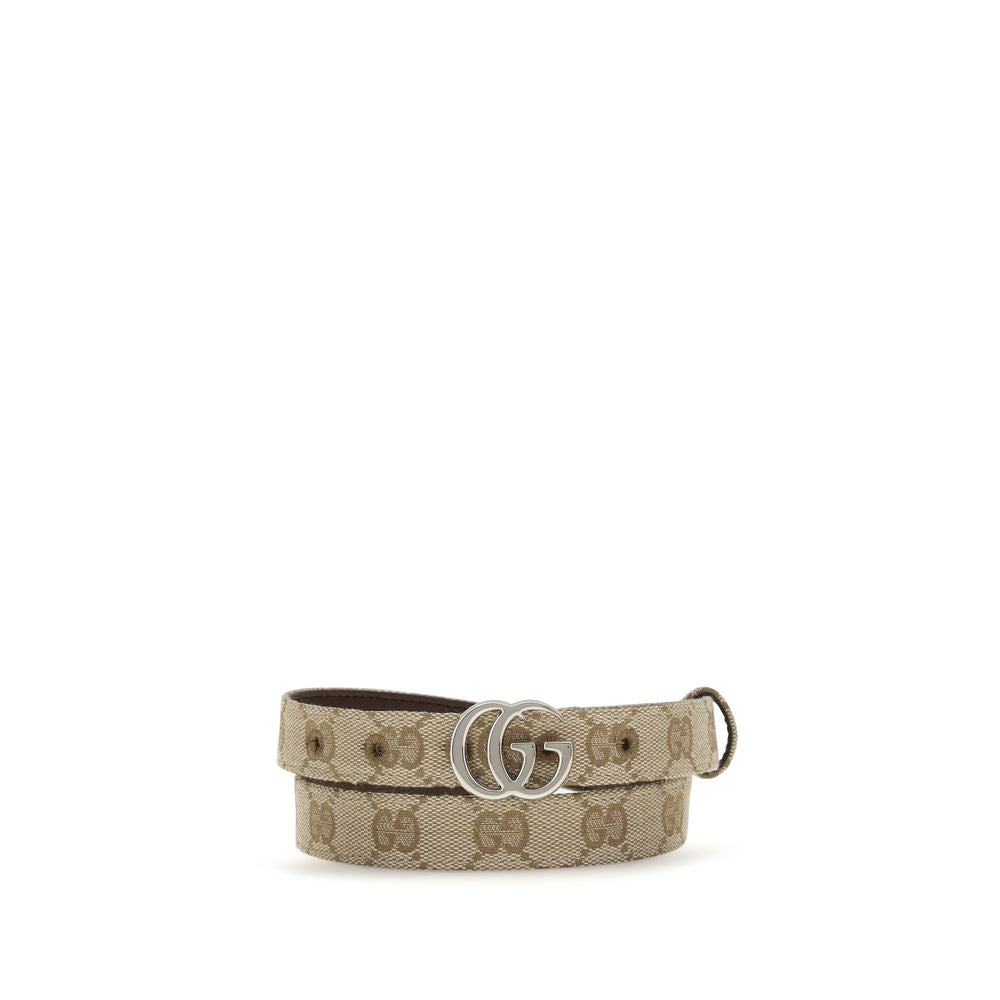 Belt by Gucci for women in fabric beige & silver features an artisanal finish, elegantly showcasing the signature style and artisanal craftsmanship of the Gg Marmont Fabric Belt design.