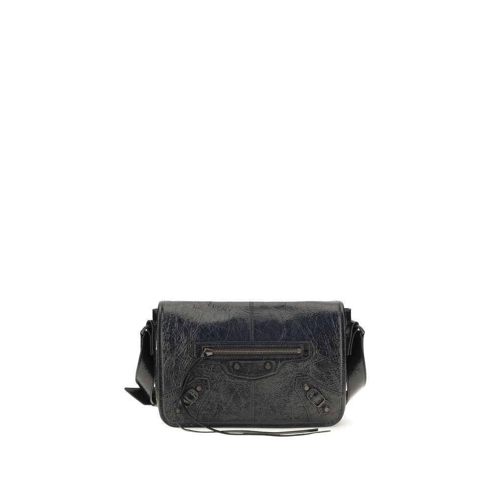 Small 2-in-1 Shoulder & Crossbody Flap Bag by Balenciaga for men in lambskin leather black presents a versatile silhouette, showcasing a secure flap, zipper & magnetic and versatile with versatile crossbody-strap, shoulder-strap & adjustable-strap for a sophisticated look.