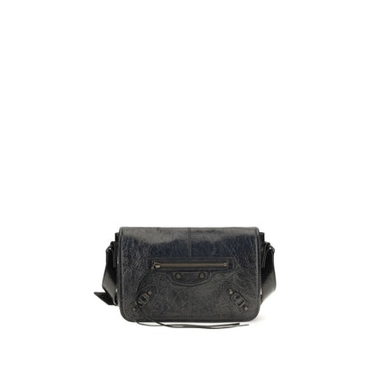 Small 2-in-1 Shoulder & Crossbody Flap Bag by Balenciaga for men in lambskin leather black presents a versatile silhouette, showcasing a secure flap, zipper & magnetic and versatile with versatile crossbody-strap, shoulder-strap & adjustable-strap for a sophisticated look.