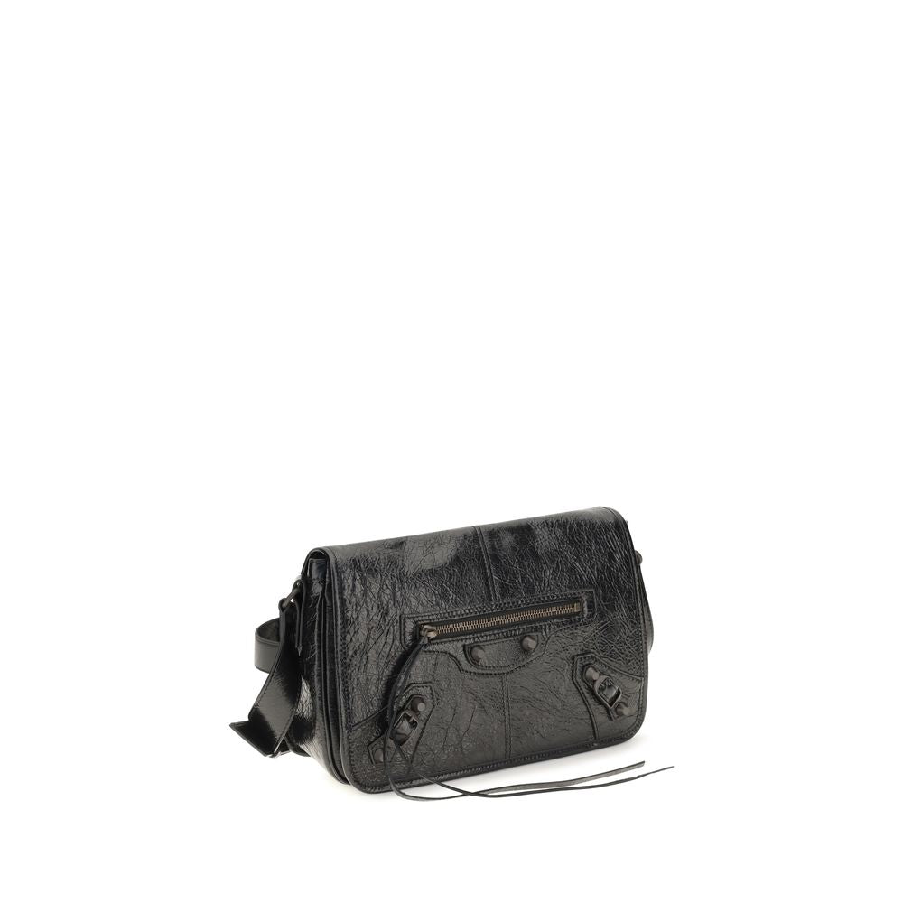 Small 2-in-1 Shoulder & Crossbody Flap Bag by Balenciaga for men in lambskin leather black showcases a enviable silhouette, artfully detailed with a secure flap, zipper & magnetic, organized , and versatile crossbody-strap, shoulder-strap & adjustable-strap for a enviable look.