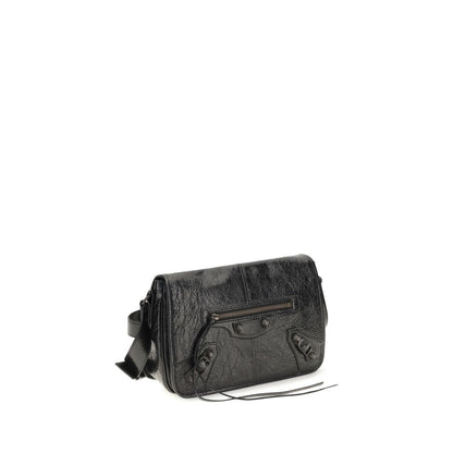 Small 2-in-1 Shoulder & Crossbody Flap Bag by Balenciaga for men in lambskin leather black showcases a enviable silhouette, artfully detailed with a secure flap, zipper & magnetic, organized , and versatile crossbody-strap, shoulder-strap & adjustable-strap for a enviable look.