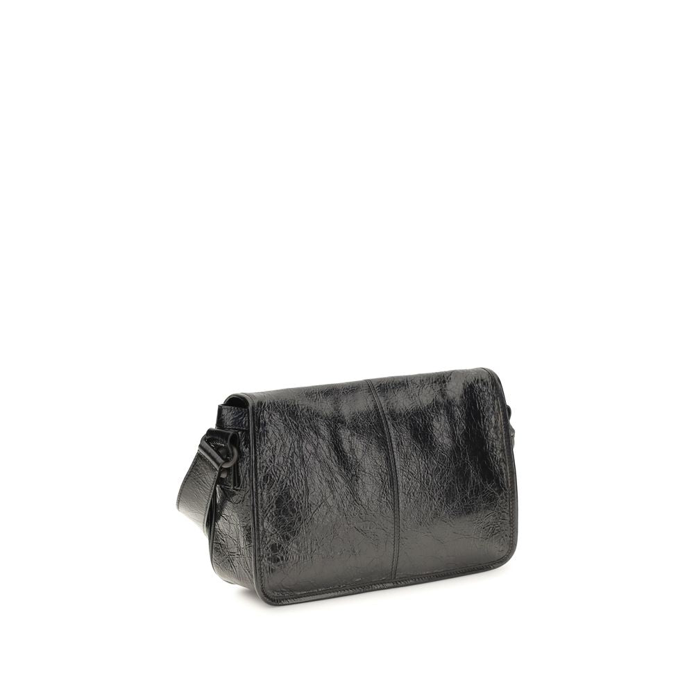 Small 2-in-1 Shoulder & Crossbody Flap Bag by Balenciaga for men in lambskin leather black features an effortlessly chic silhouette with a secure flap, zipper & magnetic, ample , and versatile crossbody-strap, shoulder-strap & adjustable-strap for effortlessly chic everyday luxury.