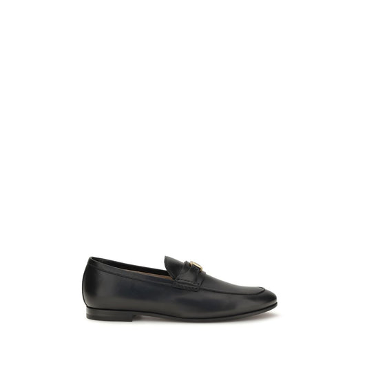 Loafer Slip-On Shoes by Valentino Garavani for men in bos taurus calf leather black, gold & signature showcases a resplendent V Logo Men's Bos Taurus Calf Leather Loafer Slip-On Shoes aesthetic, defined by its resplendent and elegant .