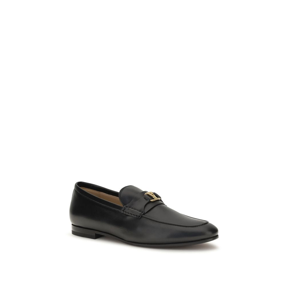 Loafer Slip-On Shoes by Valentino Garavani for men in bos taurus calf leather black, gold & signature features an dynamic silhouette from the V Logo Men's Bos Taurus Calf Leather Loafer Slip-On Shoes collection, defined by a dynamic and for a dynamic look.