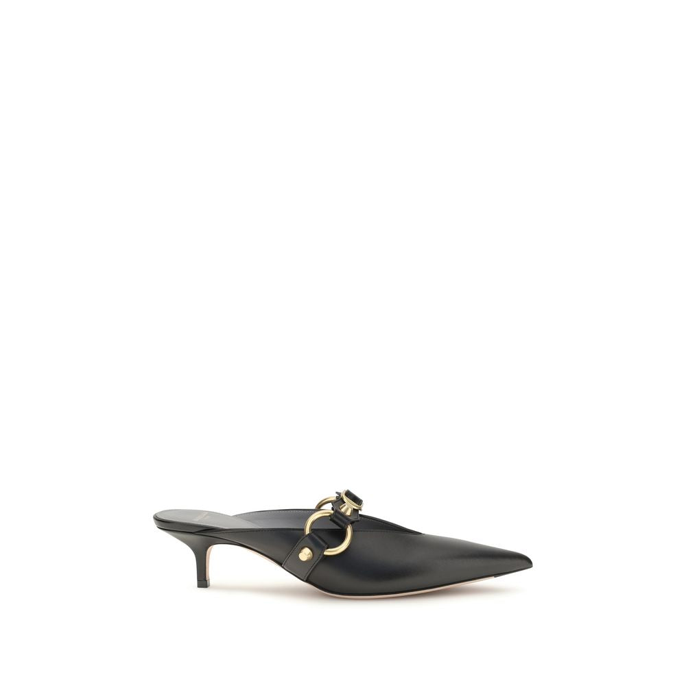 Mules Flat Shoes by Balenciaga for women in bos taurus calf leather black & gold presents a effortless chic silhouette, showcasing the City Women's Bos Taurus Calf Leather Mules Flat Shoes design with a effortless chic and pointed toe style for a sophisticated look.