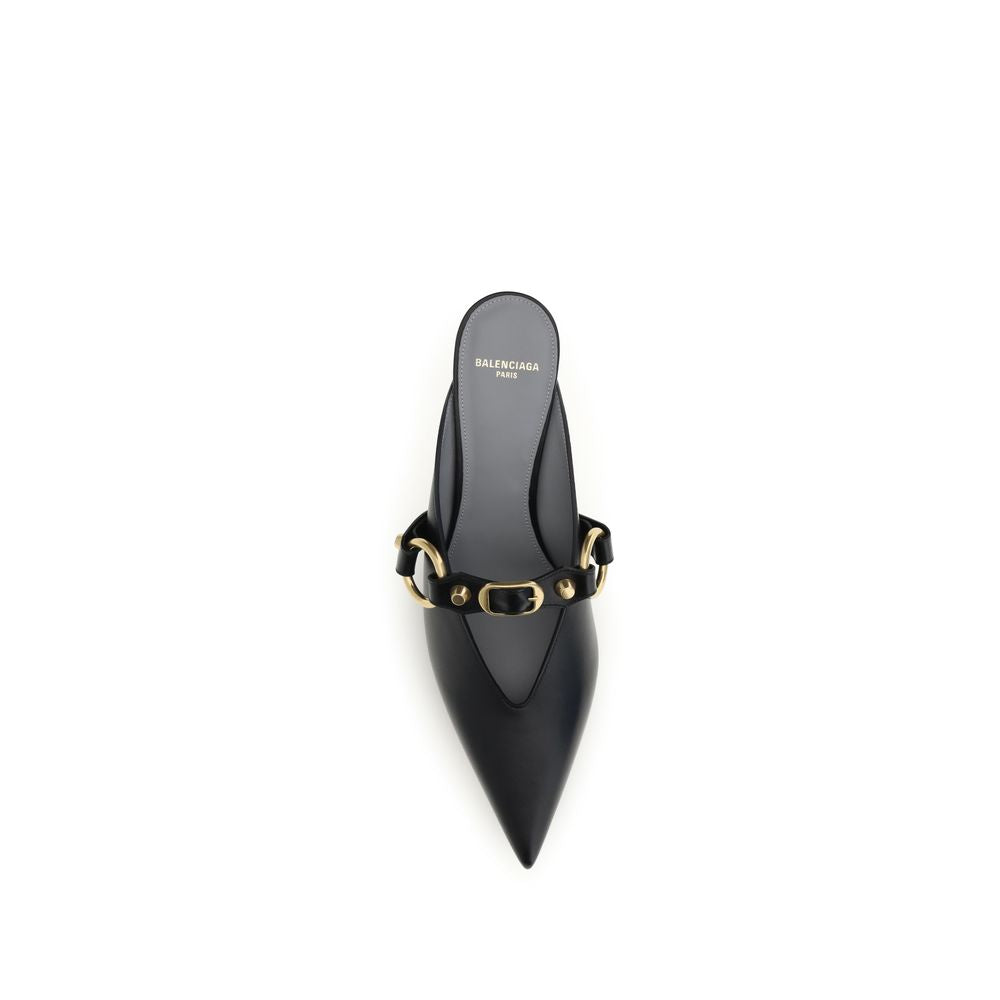 Mules Flat Shoes by Balenciaga for women in bos taurus calf leather black & gold features an captivating silhouette, showcasing the captivating style of the City Women's Bos Taurus Calf Leather Mules Flat Shoes with its distinct and refined pointed toe style.