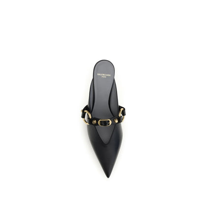 Mules Flat Shoes by Balenciaga for women in bos taurus calf leather black & gold features an captivating silhouette, showcasing the captivating style of the City Women's Bos Taurus Calf Leather Mules Flat Shoes with its distinct and refined pointed toe style.