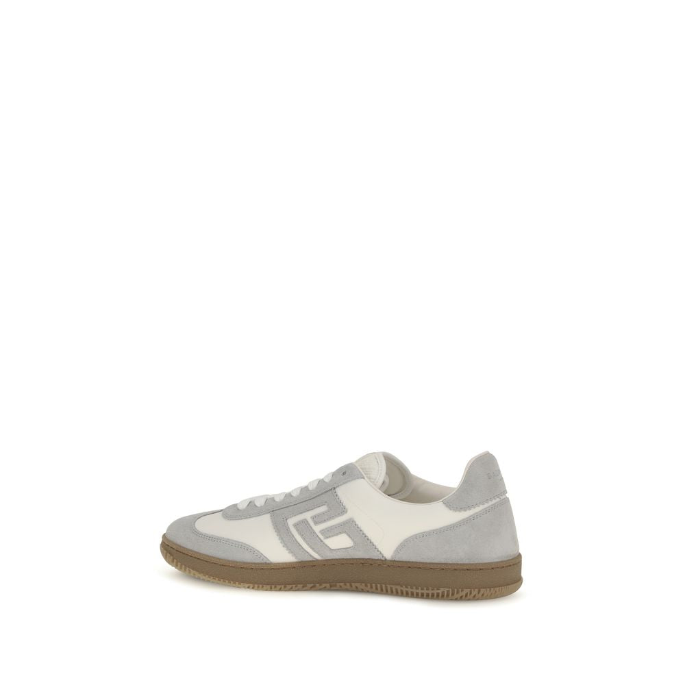 Athletic Sneakers by Balmain for men in bos taurus suede calfskin leather white showcases an impeccable silhouette, defined by an impeccable athletic style design that perfectly captures the essence of the Men's Athletic Bos Taurus Suede Calfskin Leather Sneakers.