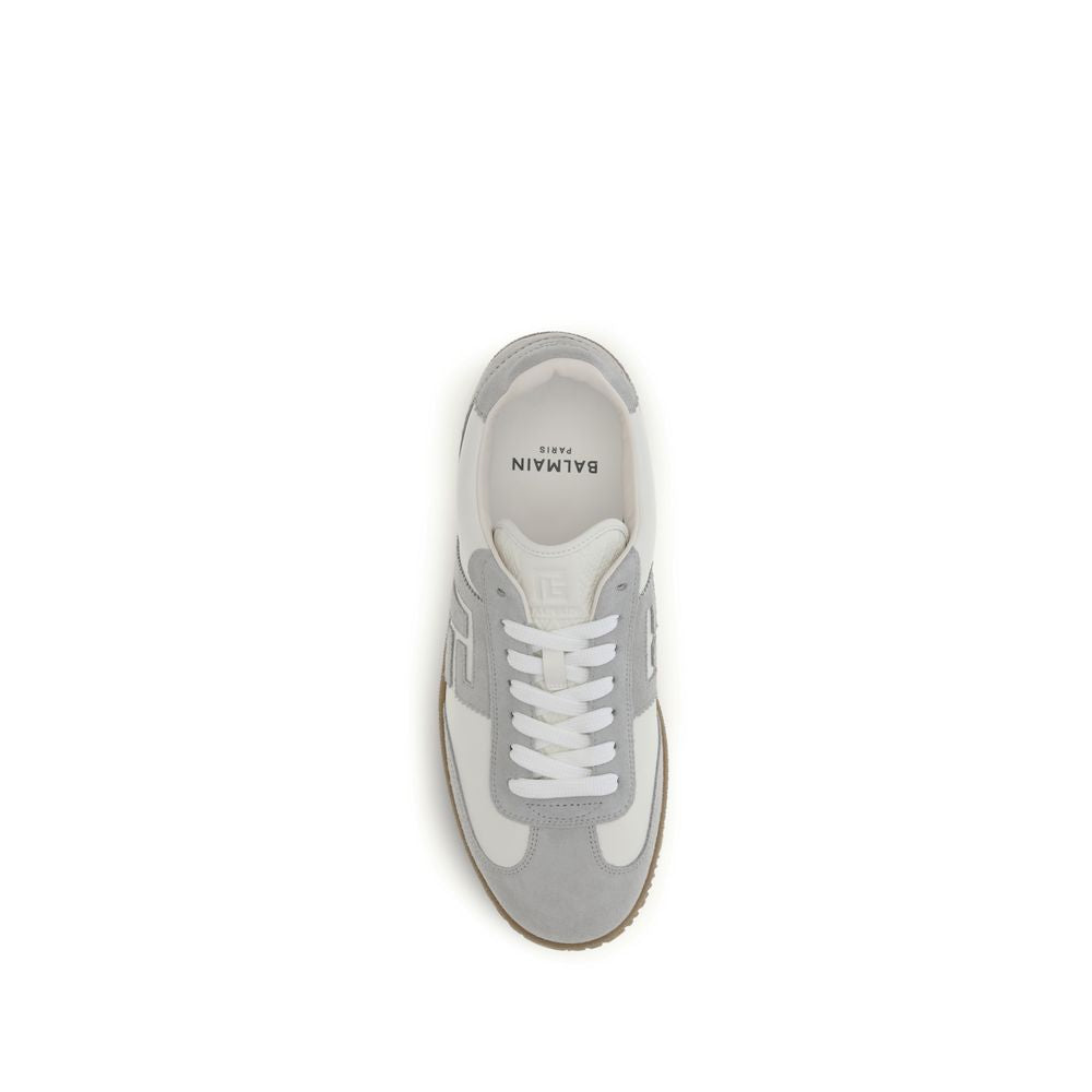 Athletic Sneakers by Balmain for men in bos taurus suede calfskin leather white showcases a architectural silhouette, artfully capturing the essence of the Men's Athletic Bos Taurus Suede Calfskin Leather Sneakers with its signature architectural athletic style construction.