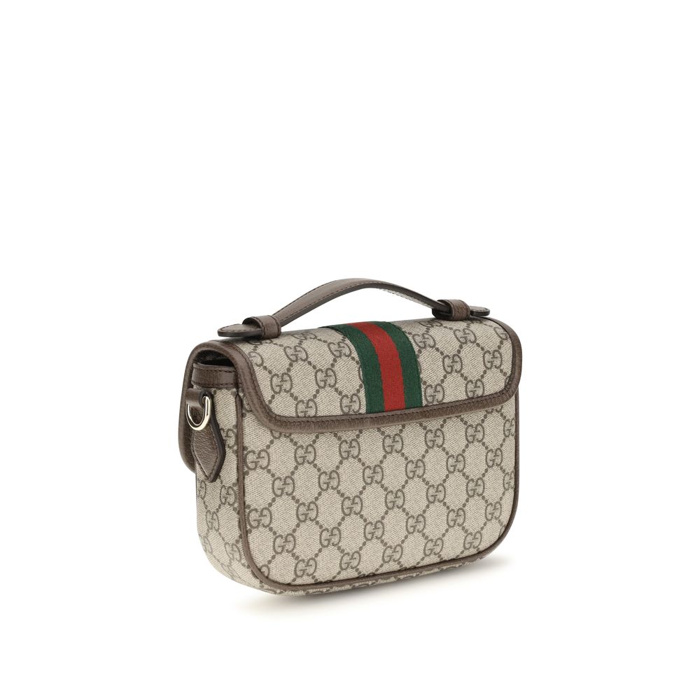 Small Flap Handbag by Gucci for women in leather beige, gold, monogram & striped presents a ornamental silhouette, showcasing a secure flap & magnetic, ample , and versatile shoulder-strap, handle, adjustable-strap & detachable-strap for a ornamental finish.