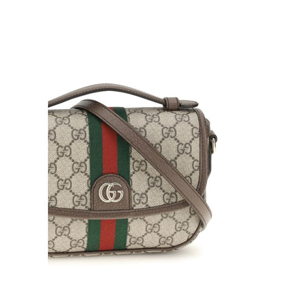 Small Flap Handbag by Gucci for women in leather beige, gold, monogram & striped features a signature silhouette, showcasing a secure flap & magnetic and signature with versatile shoulder-strap, handle, adjustable-strap & detachable-strap for a sophisticated look.