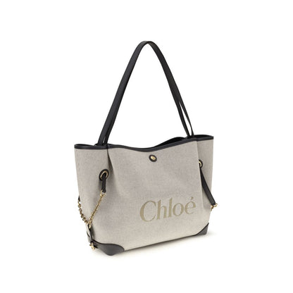 Bucket Tote Shoulder Bag by Chloé for women in cotton canvas & calf leather gray, gold & signature showcases a enviable silhouette, artfully detailed with a secure , organized , and versatile for a enviable look.