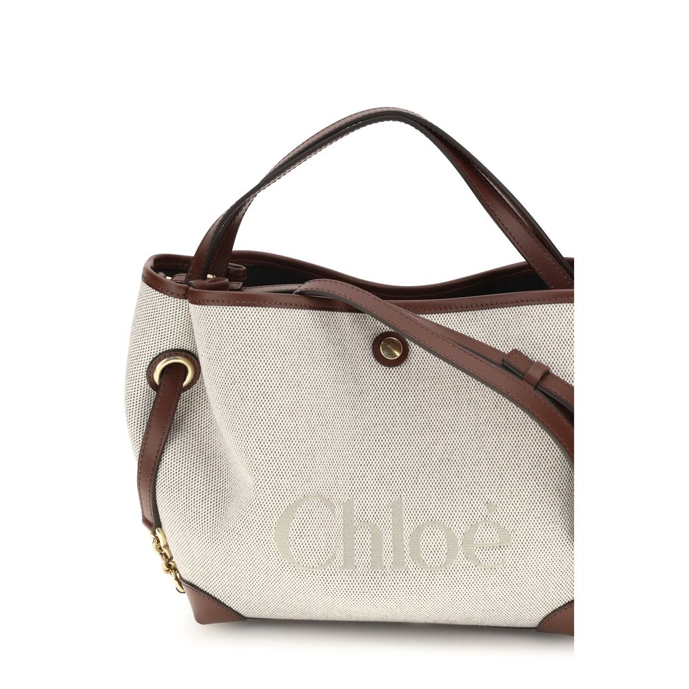 Handbag by Chloé for women in modal & cotton beige & jacquard features a exquisite silhouette, showcasing a secure magnetic & button and exquisite with versatile shoulder-strap, handle & adjustable-strap for a exquisite finish.