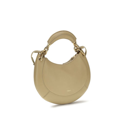 Shoulder Bag by Chloé for women in bio-acetate cotton & bos taurus calf leather beige showcases a enviable silhouette, artfully detailed with a secure buckle, organized cardholder, and versatile shoulder-strap & adjustable-strap for a enviable look.