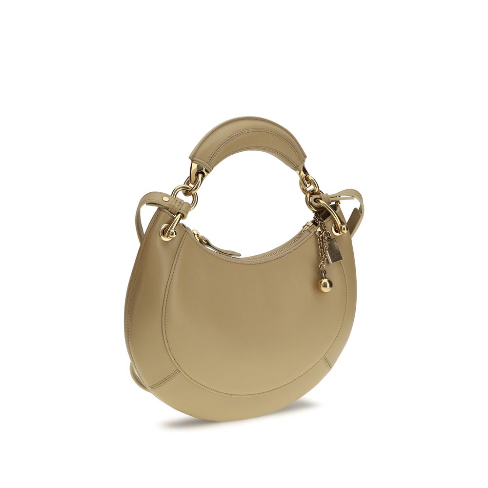 Shoulder Bag by Chloé for women in bio-acetate cotton & bos taurus calf leather beige features a enviable silhouette, showcasing a secure buckle, ample cardholder, and enviable shoulder-strap & adjustable-strap for a enviable finish.
