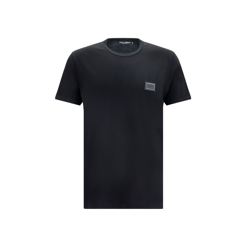 T-Shirt by Dolce & Gabbana for men in cotton black showcases a fashionable silhouette, elegantly detailed with a fashionable short-sleeve and crew neckline for a sophisticated, high-fashion look.