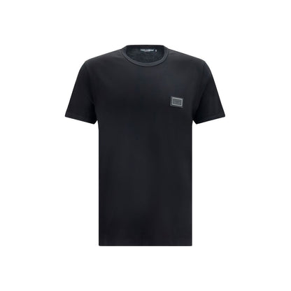 T-Shirt by Dolce & Gabbana for men in cotton black showcases a fashionable silhouette, elegantly detailed with a fashionable short-sleeve and crew neckline for a sophisticated, high-fashion look.