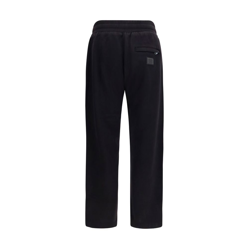 Jogger Sweatpants by Dolce & Gabbana for men in cotton black features an kinetic straight-leg & regular-fit and long with a , showcasing high-performance for an kinetic look.