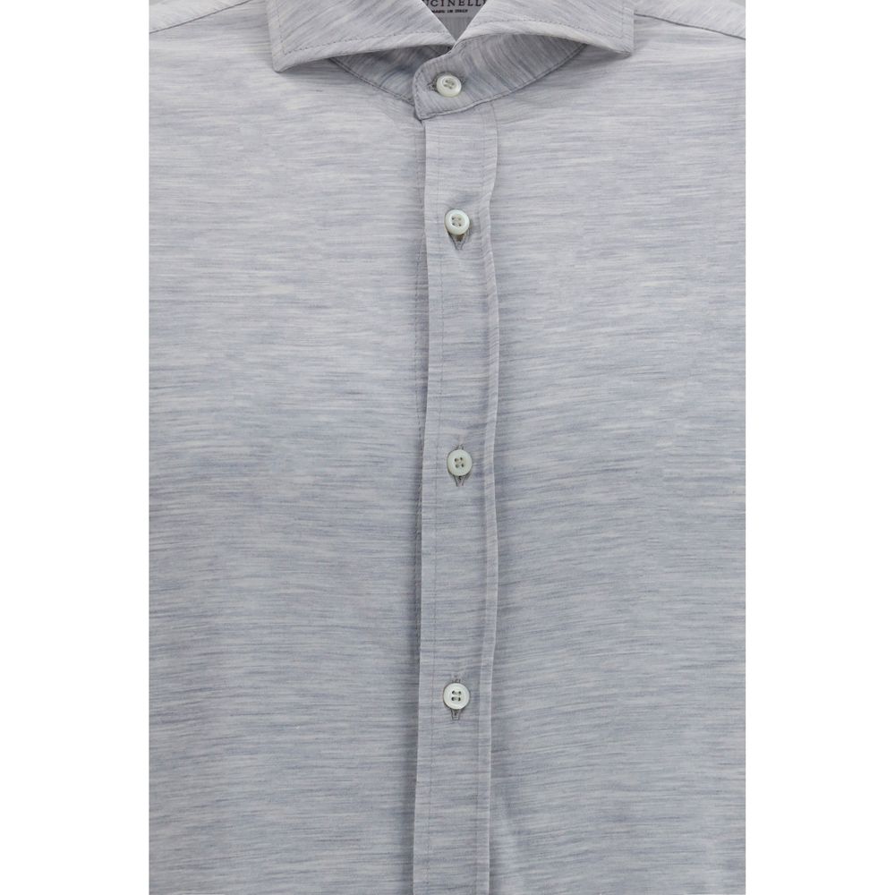 Dress Shirt by Brunello Cucinelli for men in cotton & silk blue features an architectural silhouette with a refined and elegant for a architectural look.