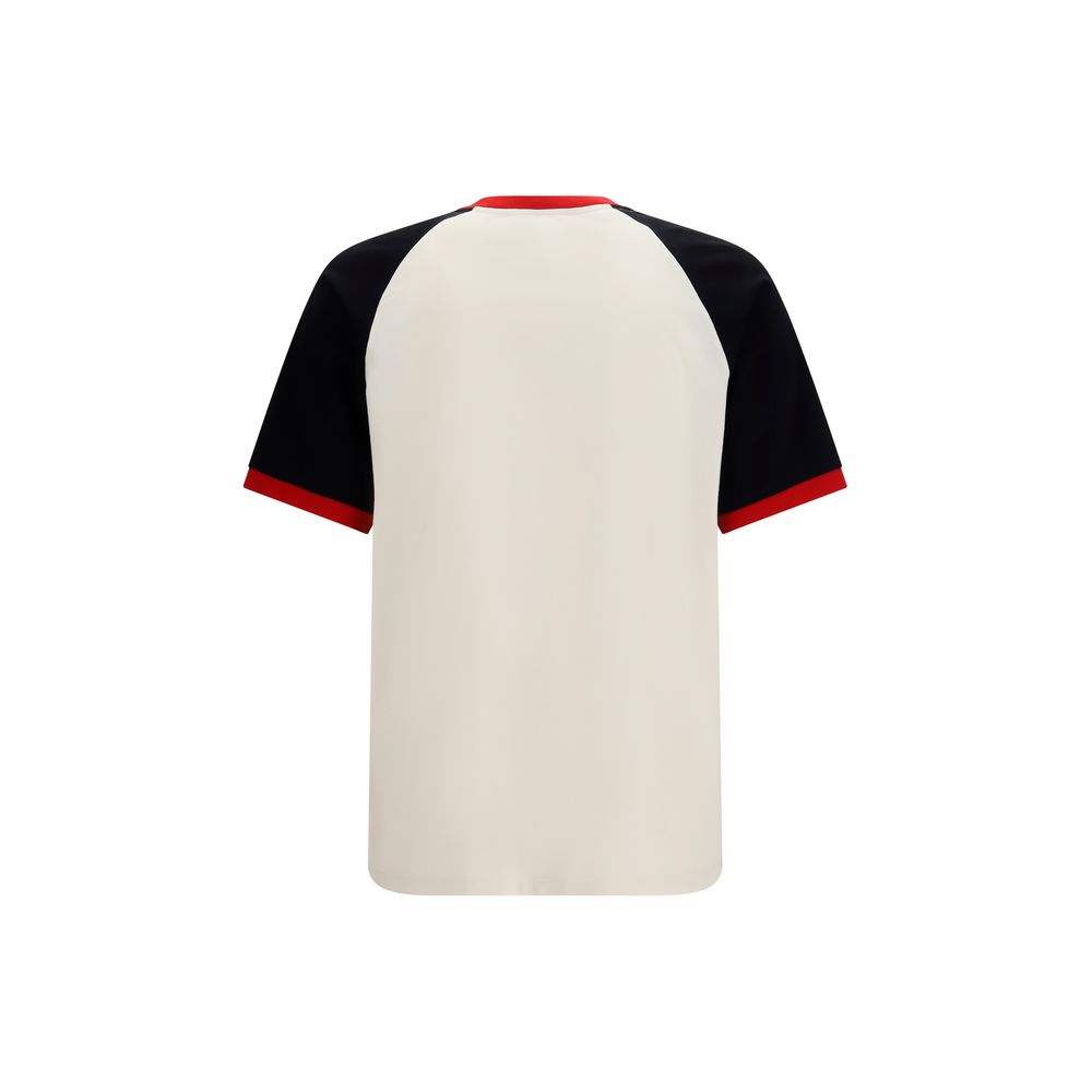 T-Shirt by Versace for men in cotton white showcases a unassuming silhouette, artfully detailed with a refined crew neckline and unassuming for a sophisticated, contemporary look.
