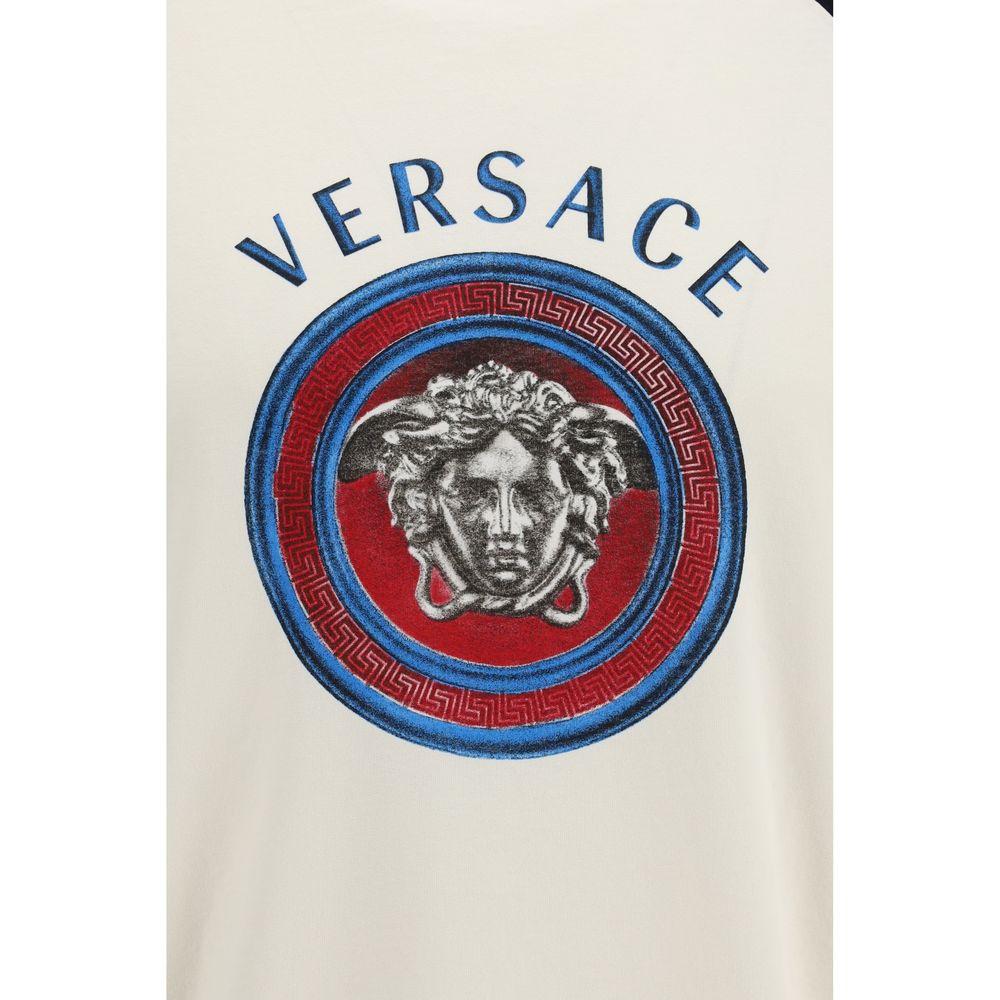 T-Shirt by Versace for men in cotton white showcases a fashionable silhouette, elegantly detailed with a fashionable and for a sophisticated, high-fashion look.