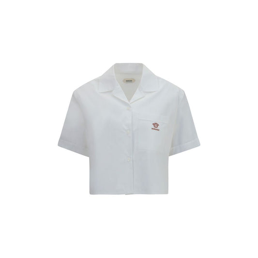 Dress Shirt by Versace for women in cotton white showcases a sleek silhouette, elegantly detailed with a sleek lapel neckline and short-sleeve for a sleek finish.
