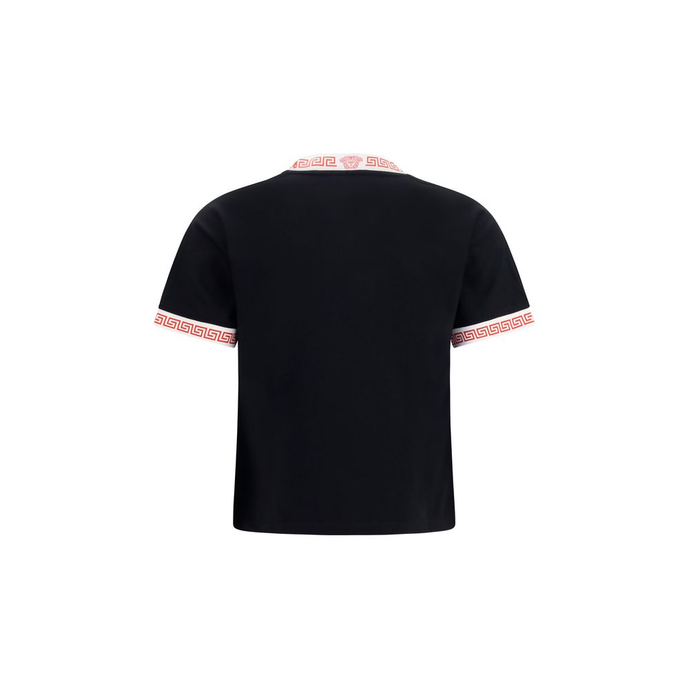 T-Shirt by Versace for women in cotton black showcases a unassuming silhouette, artfully detailed with a refined crew neckline and unassuming for a sophisticated, contemporary look.