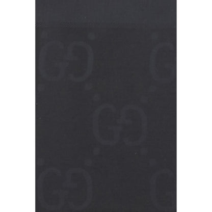Scarf by Gucci for women in wool & silk black, patterned & jacquard presents a cosy silhouette, artfully capturing the sophisticated design and premium aesthetic of the Gg Wool & Silk Frayed-Edge Scarf.